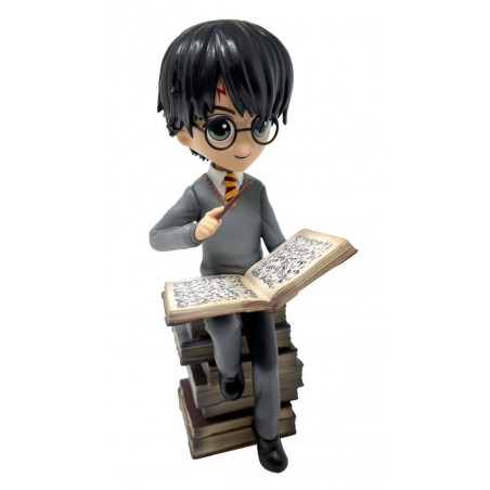 HARRY POTTER ON PILE OF SPELL FIGURE STATUE
